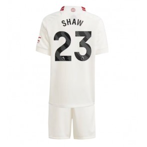 Manchester United Luke Shaw #23 Koszulka Trzecich Dziecięca 2023-24 Krótki Rękaw (+ Krótkie spodenki)